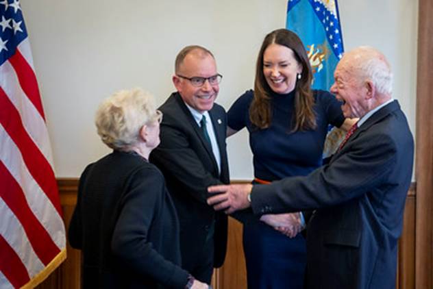 A group of people shaking hands
AI-generated content may be incorrect.